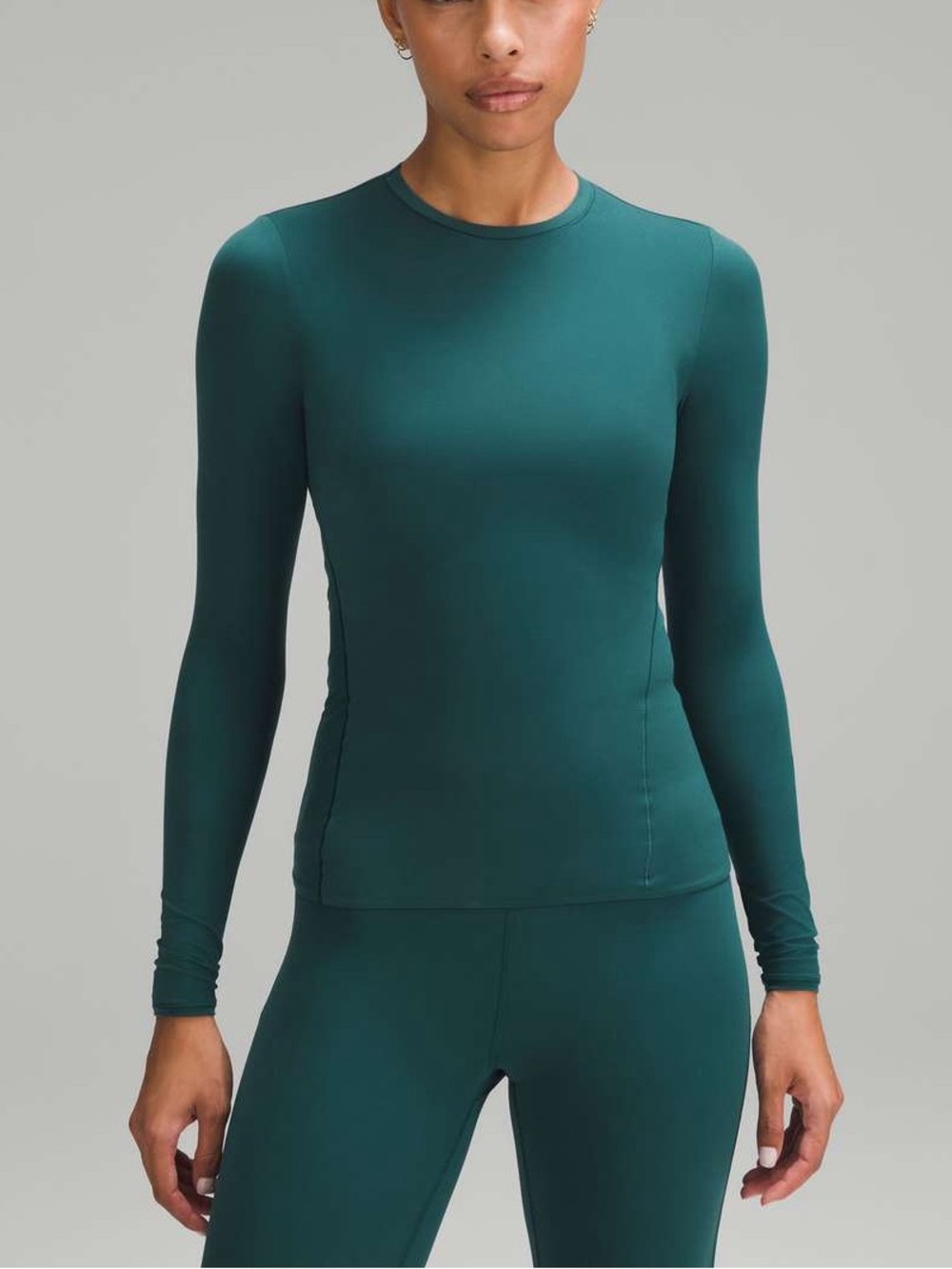 Lululemon Wundermost Ultra-Soft Nulu Crewneck Long-Sleeve Shirt
Storm Teal Sz 2